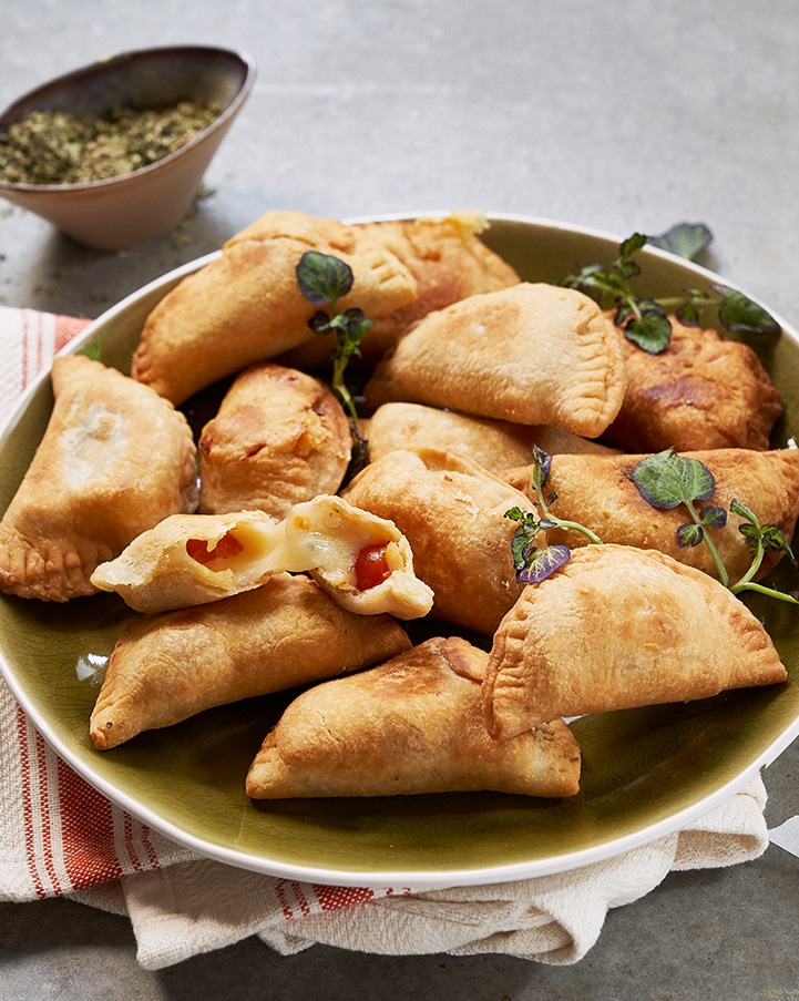 THE RECIPE IS SIMPLE: EMPANADAS, provolone & cherry tomato